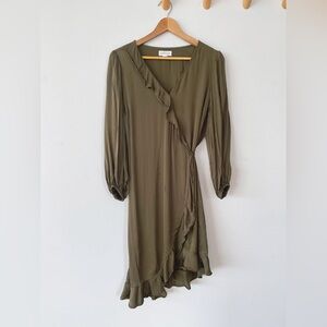 Anthropologie velvet Khaki green midi wrap dress with ruffle details.